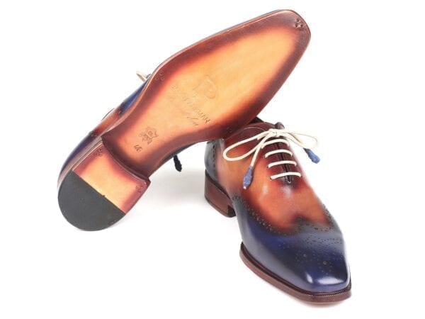 The sole of Two tone Paul Parkman Men's Wingtip Oxfords Turquoise and Tobacco